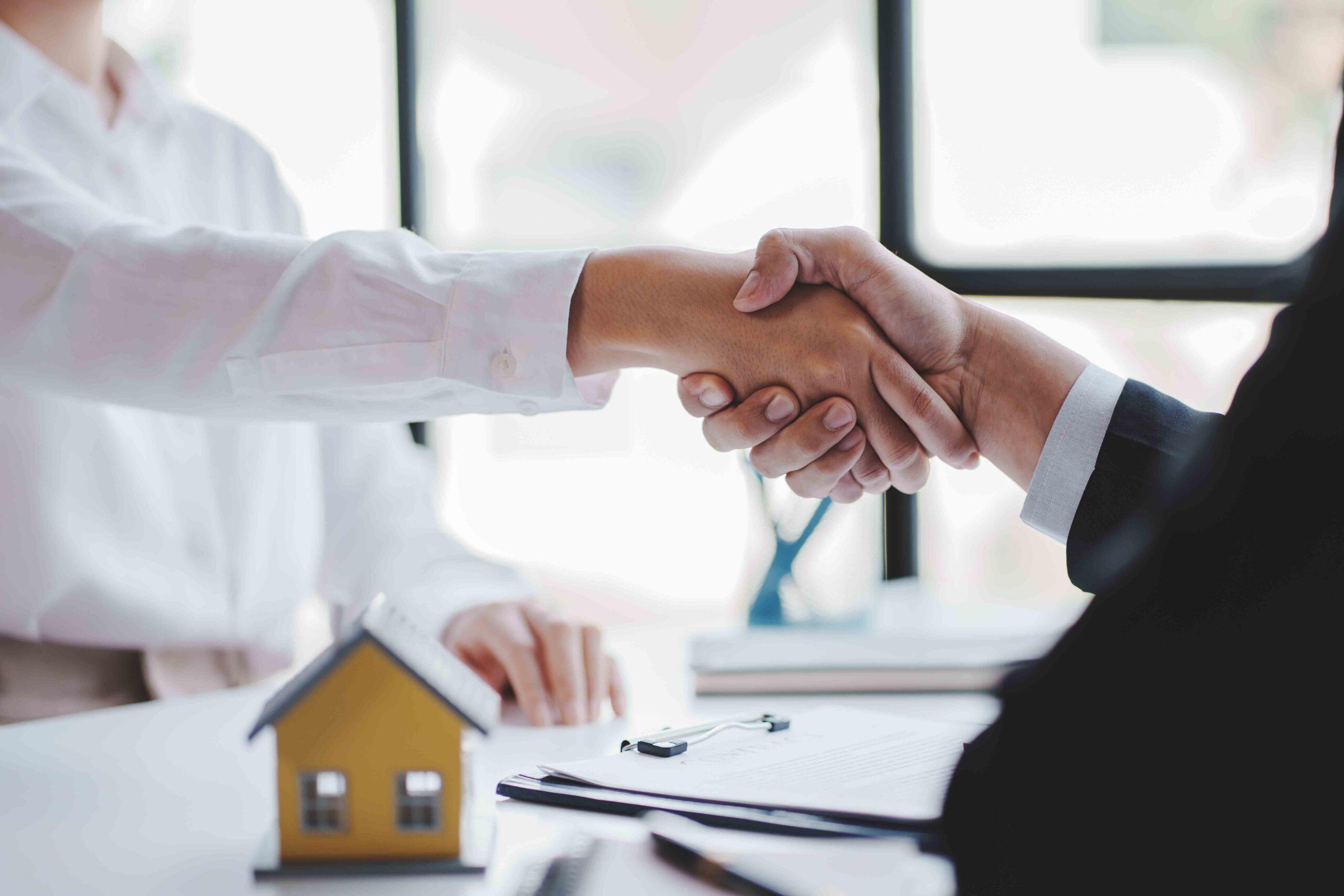 handshake real estate agents deliver sample homes 2025 03 05 07 03 11 utc scaled