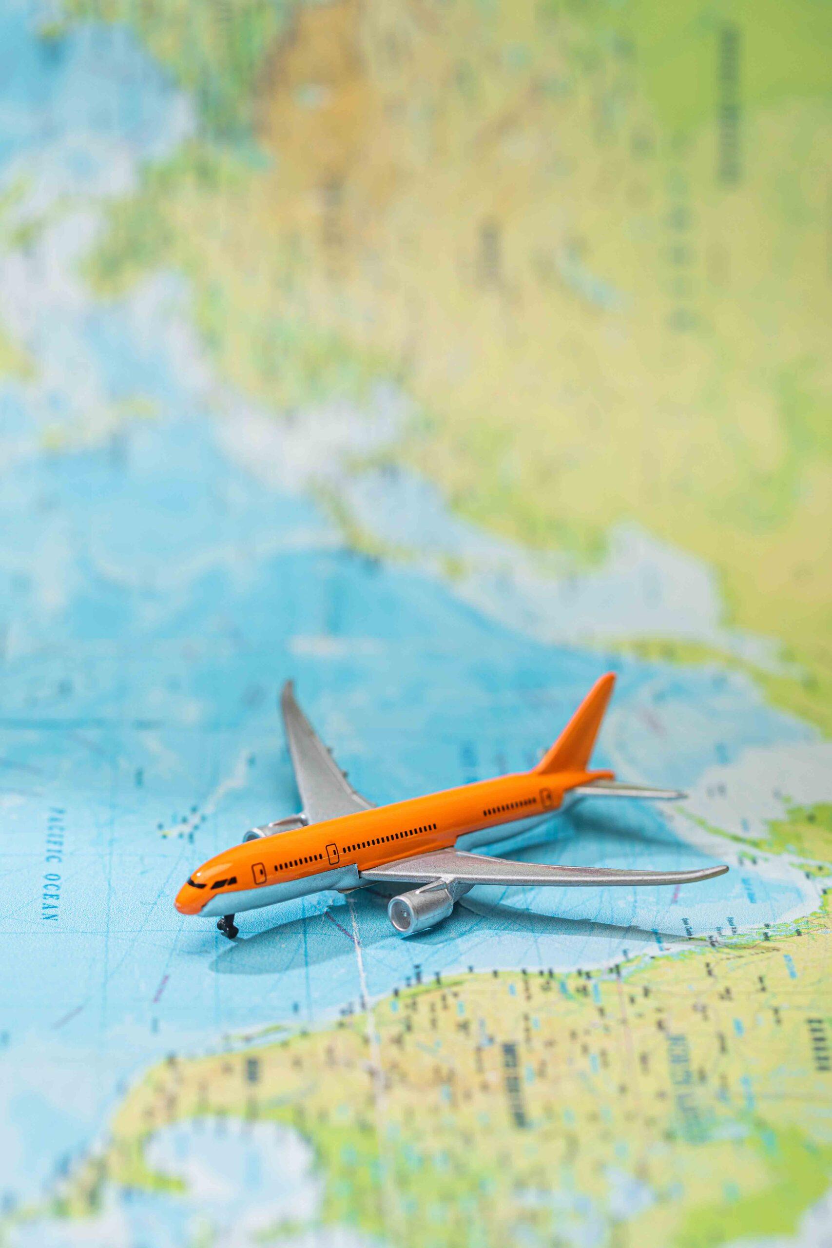selective focus of small plane on world map 2024 11 07 16 37 32 utc scaled